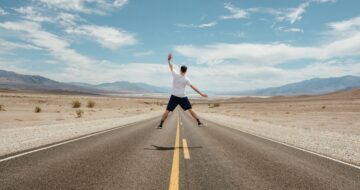 man jumping on the road