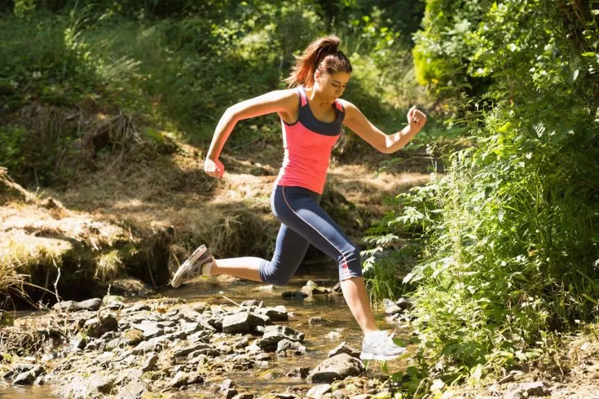 864x576xSporty young woman leaping over a stream in a forest on a run.jpeg.pagespeed.ic .lSl enterprise intelligence hub