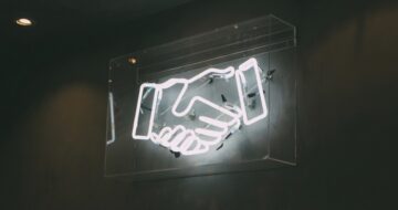 neon handshake