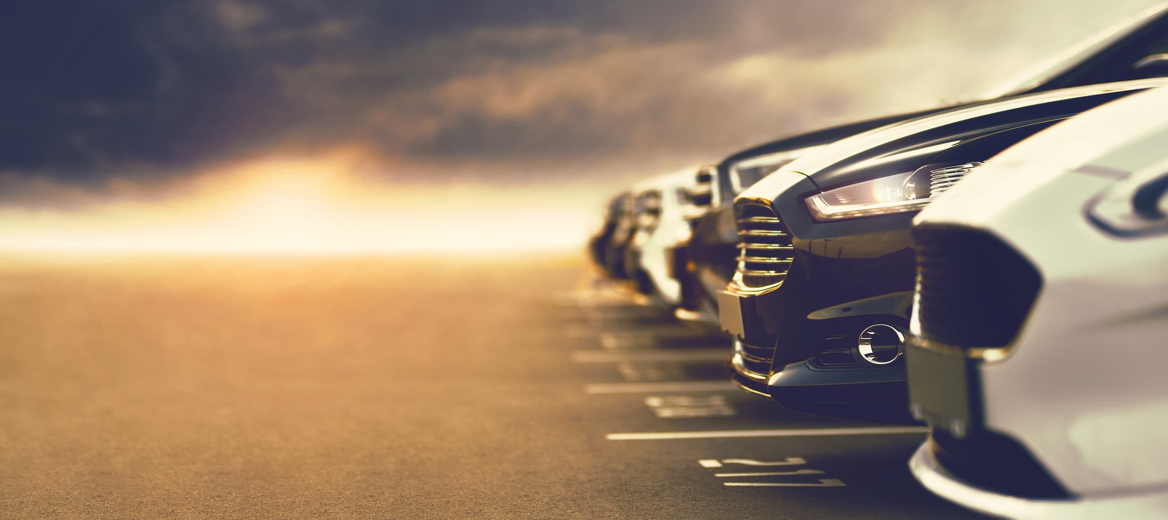 open air car dealership with prestigious cars