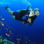 woman scuba diving c data integration software